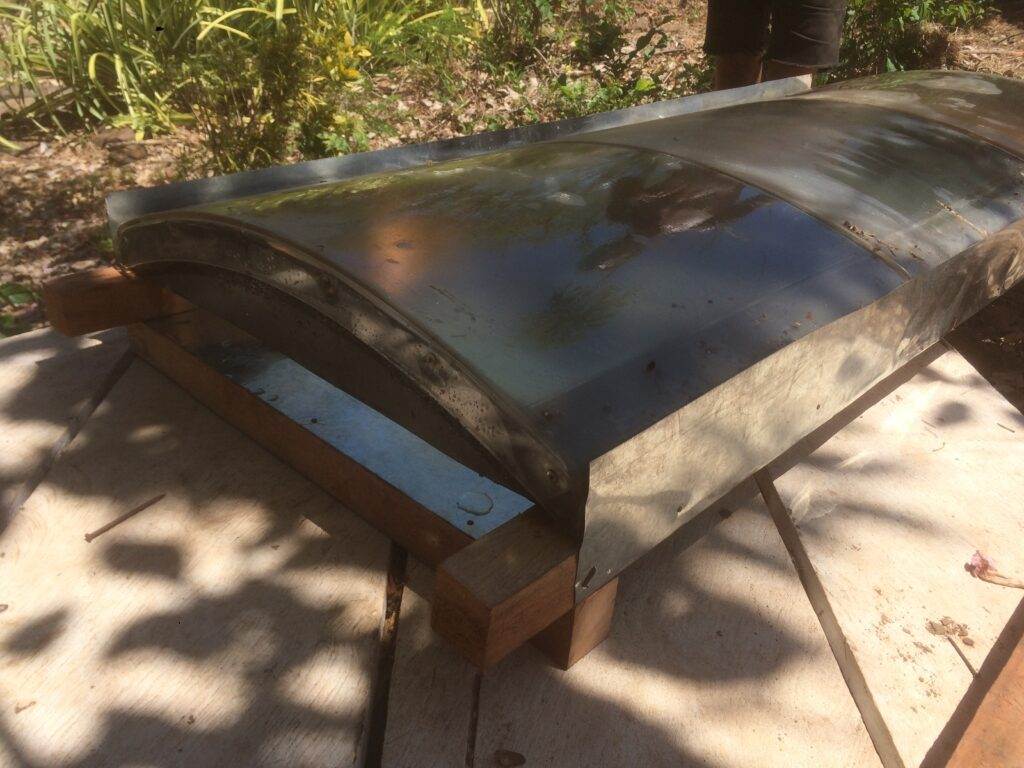 Lining up the sheet metal and acrylic domes.